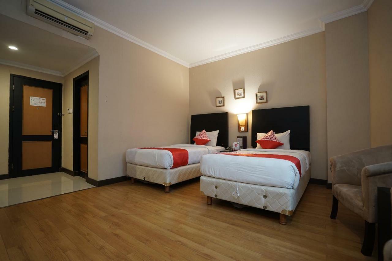 Capital O 1128 Hotel Imara Palembang Buitenkant foto