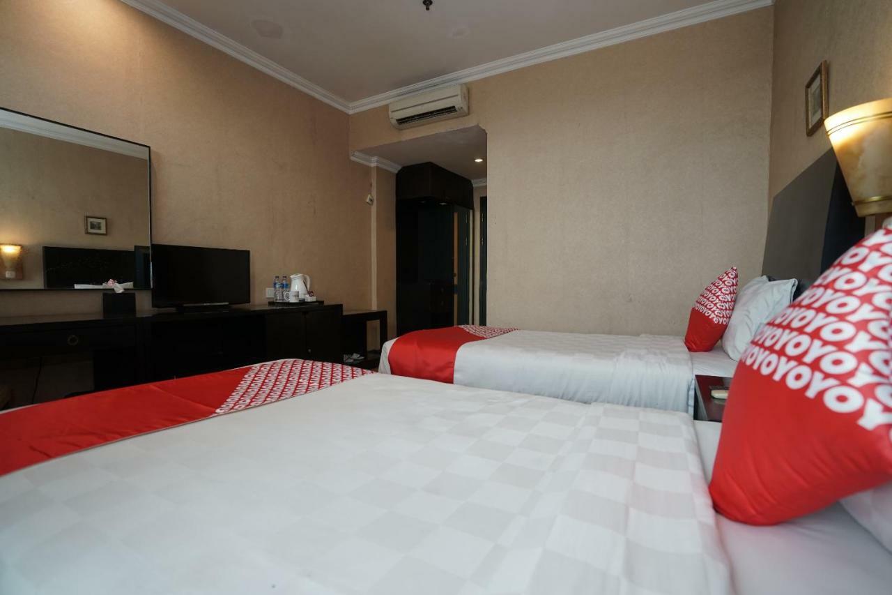 Capital O 1128 Hotel Imara Palembang Buitenkant foto