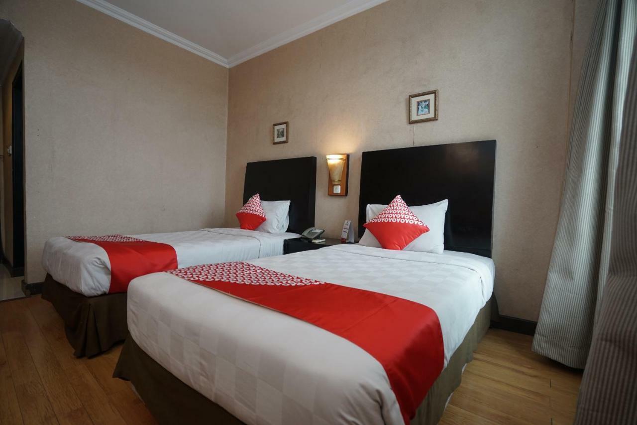 Capital O 1128 Hotel Imara Palembang Buitenkant foto