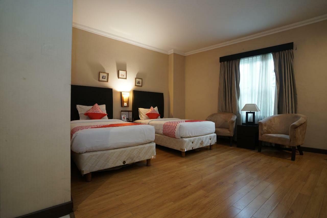 Capital O 1128 Hotel Imara Palembang Buitenkant foto