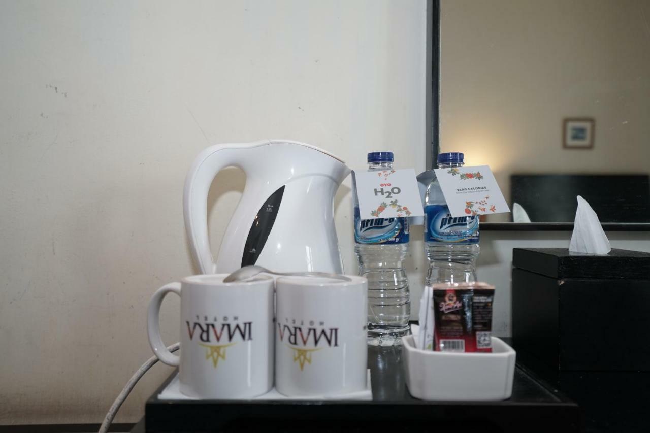 Capital O 1128 Hotel Imara Palembang Buitenkant foto