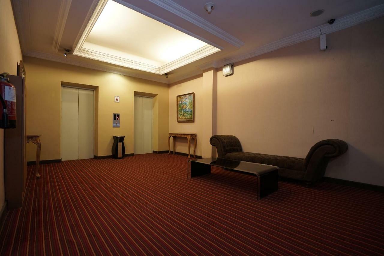Capital O 1128 Hotel Imara Palembang Buitenkant foto