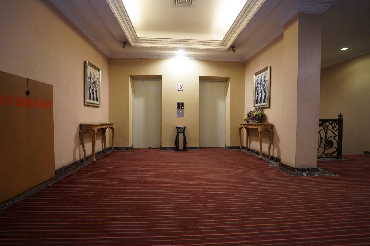 Capital O 1128 Hotel Imara Palembang Buitenkant foto