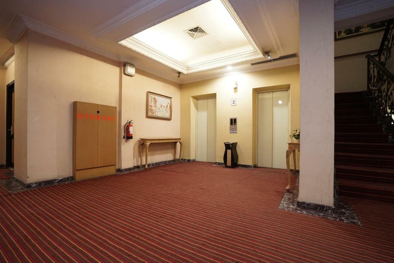 Capital O 1128 Hotel Imara Palembang Buitenkant foto